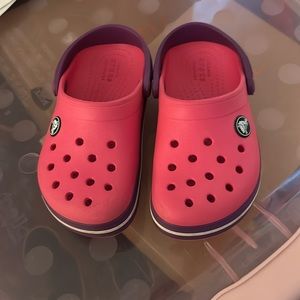 CROCS Girls pink and purple sz 10